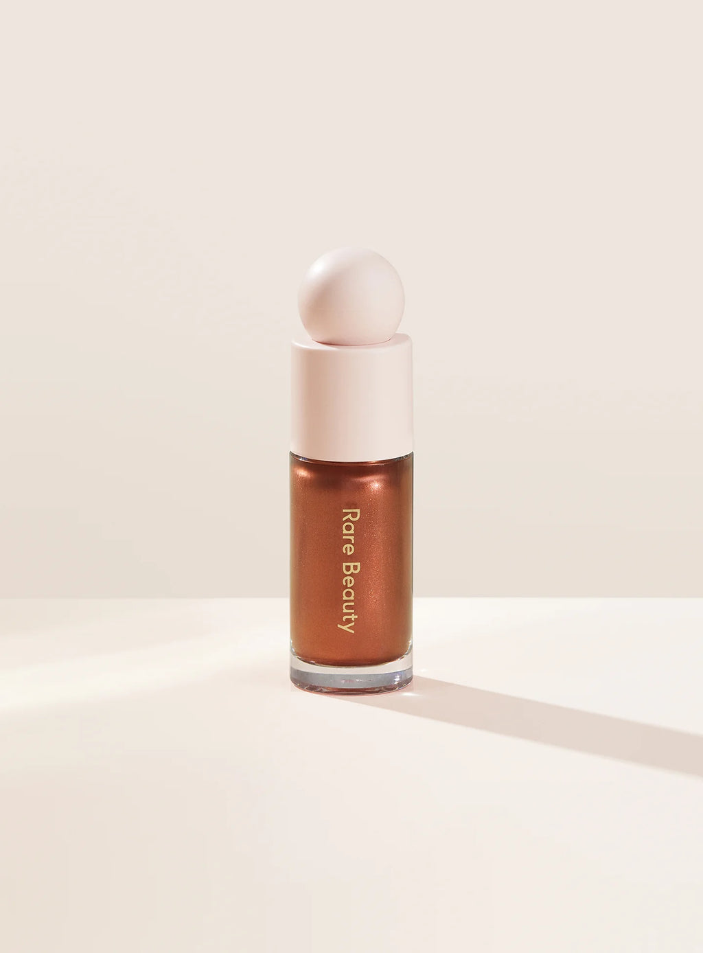 RARE BEAUTY Positive Light Liquid Luminizer tono Reflect